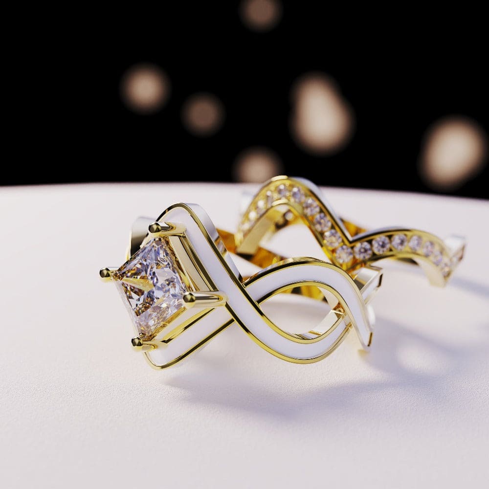 Gold-toned ring set with a square clear stone, white enamel accents, and a matching paved contoured band.