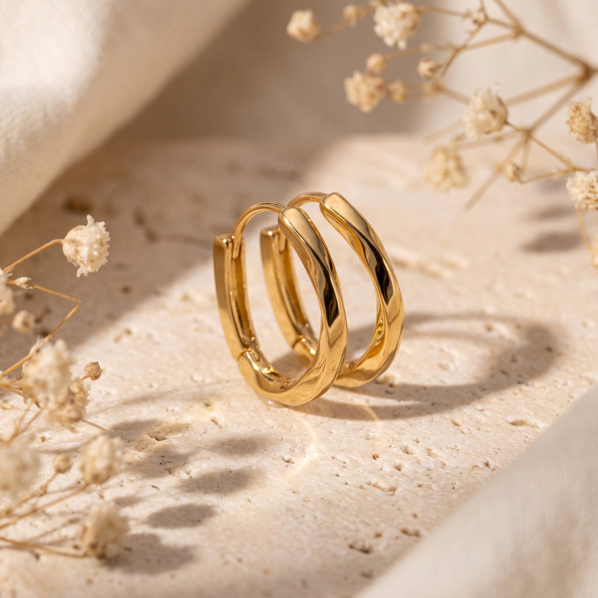 Les boucles d’oreilles créoles torsadées
