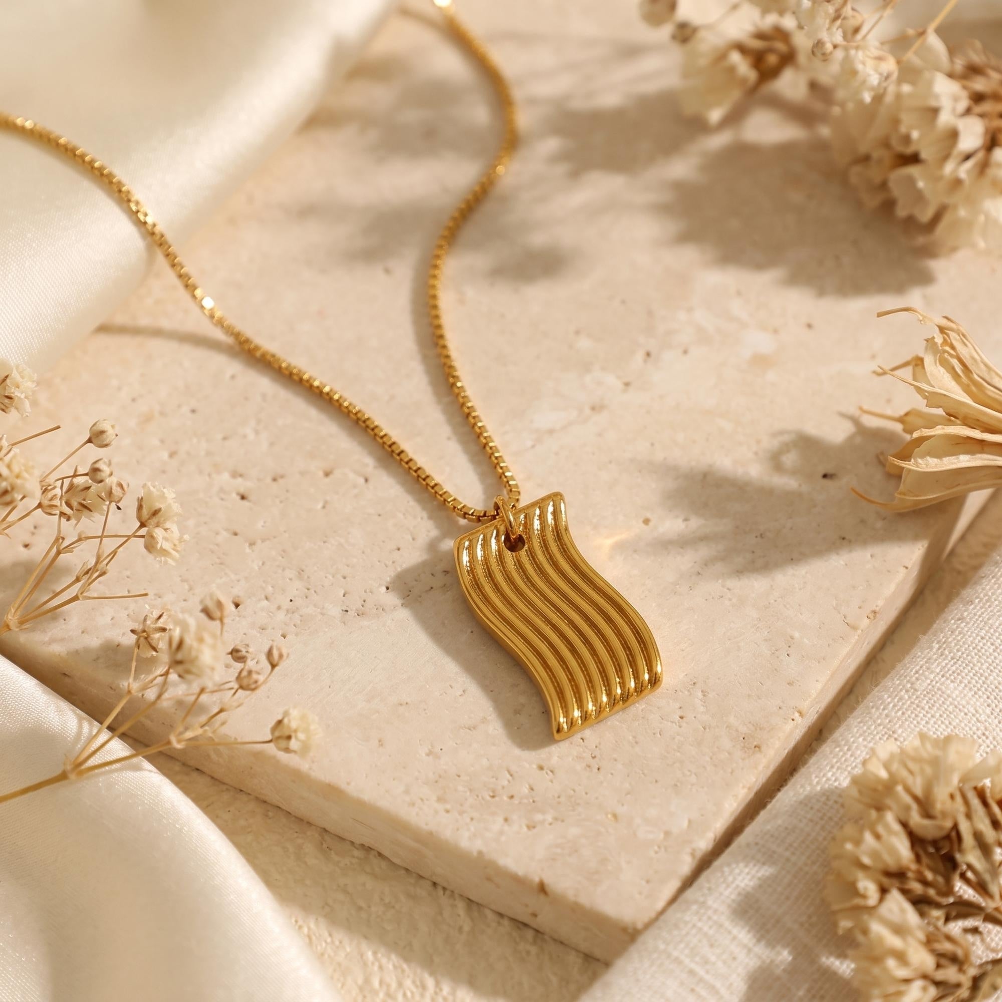 The Fluid Wave Pendant Necklace