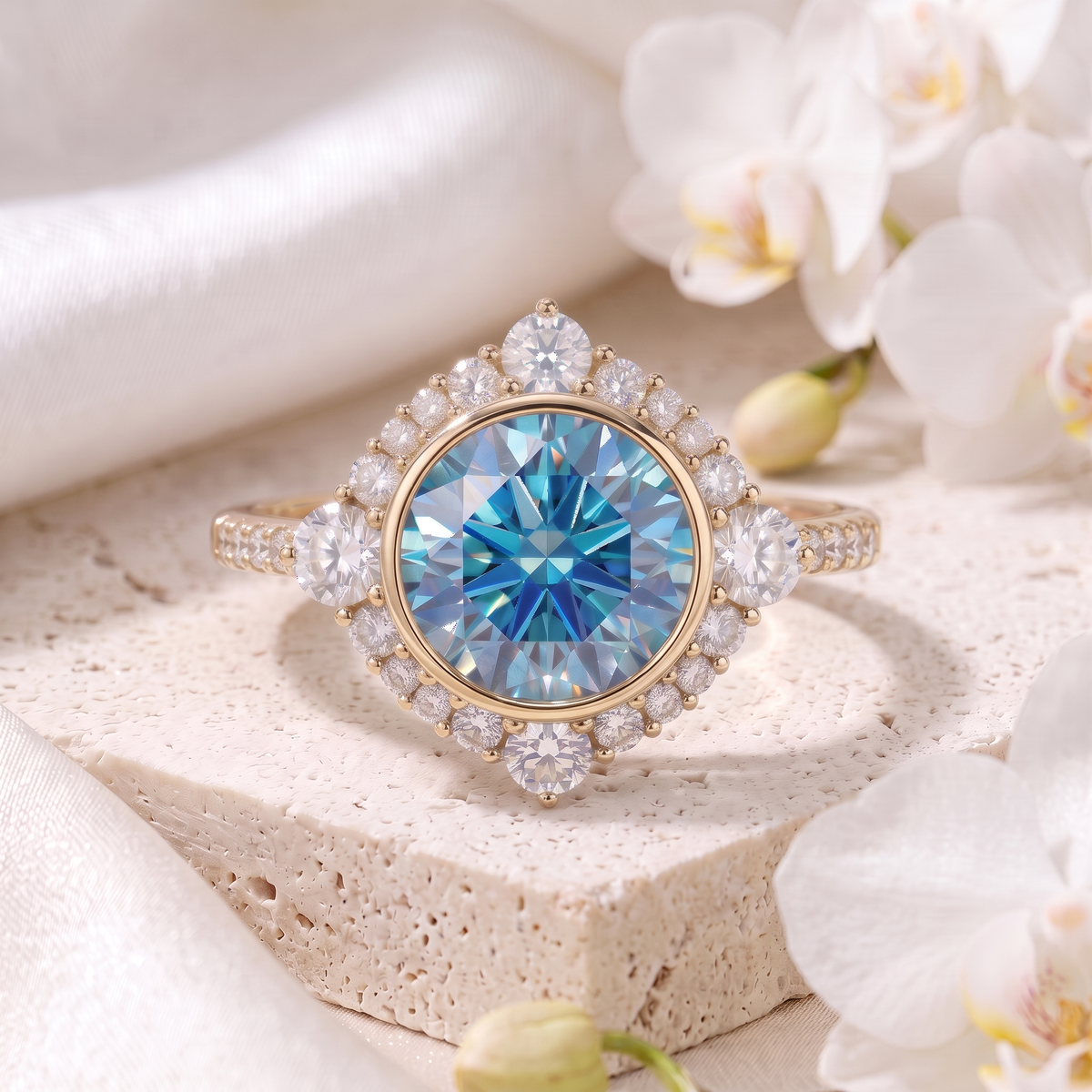 Front view of a yellow gold halo ring featuring a round blue moissanite center stone and diamond accent stones.