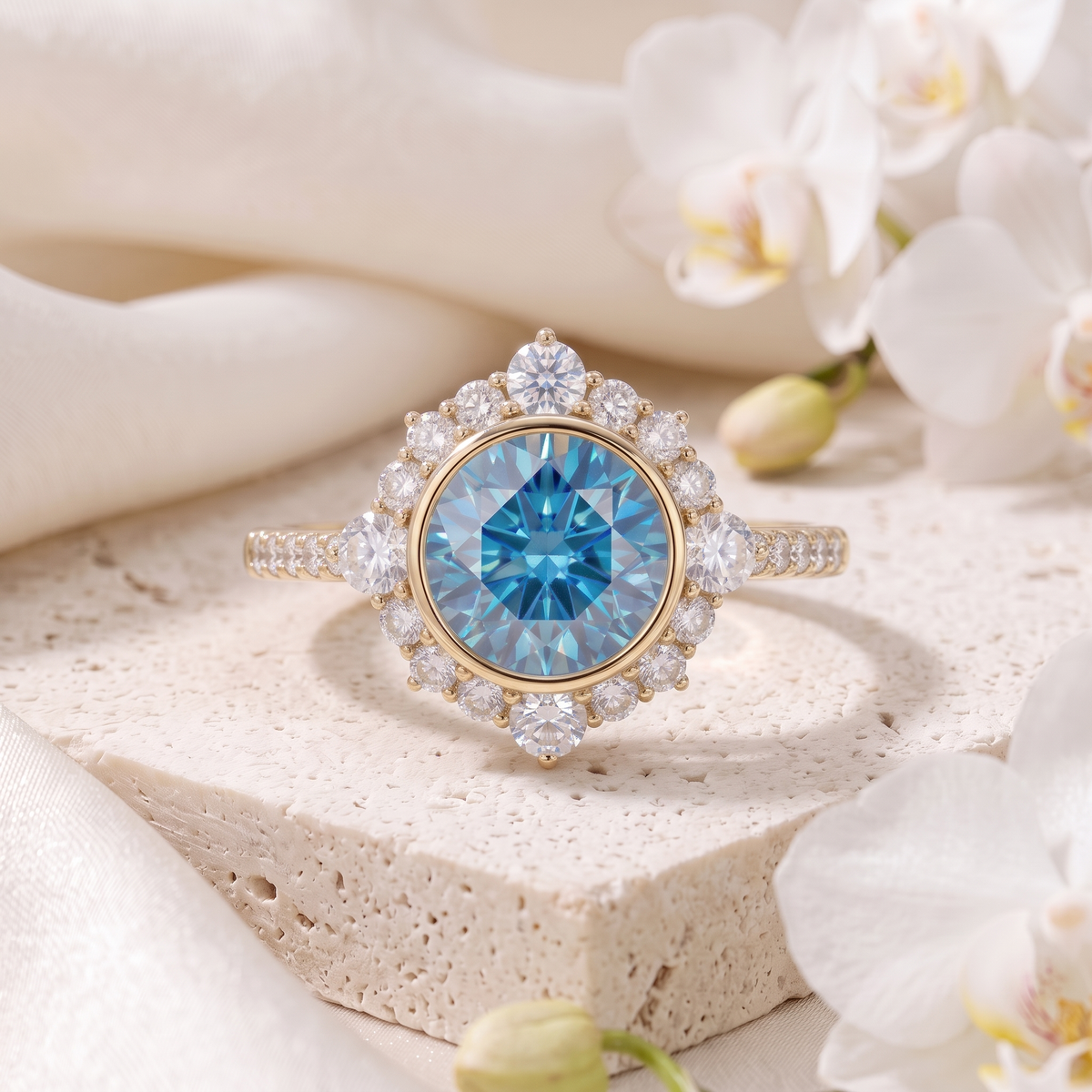 Vintage halo round blue moissanite engagement ring in yellow gold displayed on a textured stone.