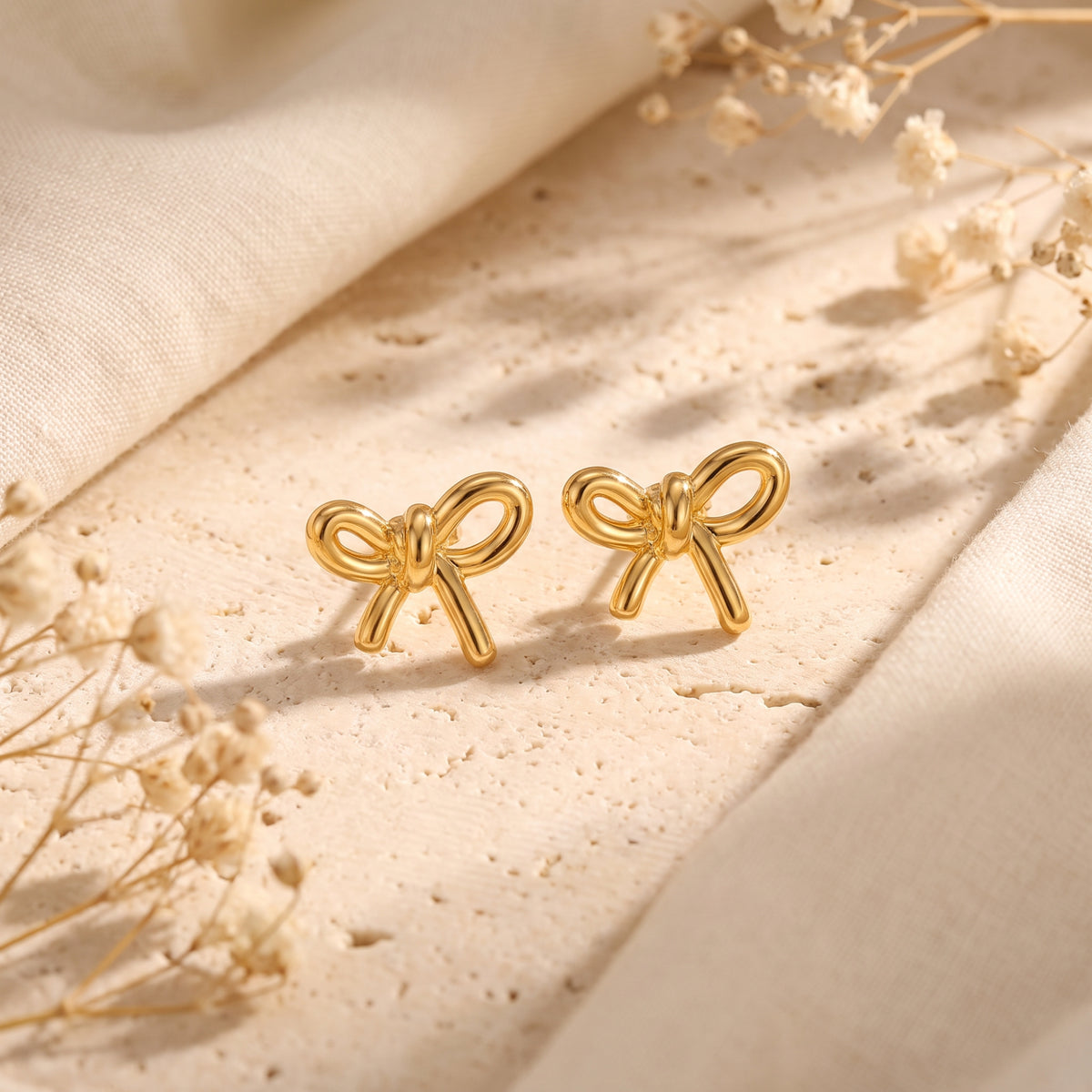 Les boucles d’oreilles nœud papillon