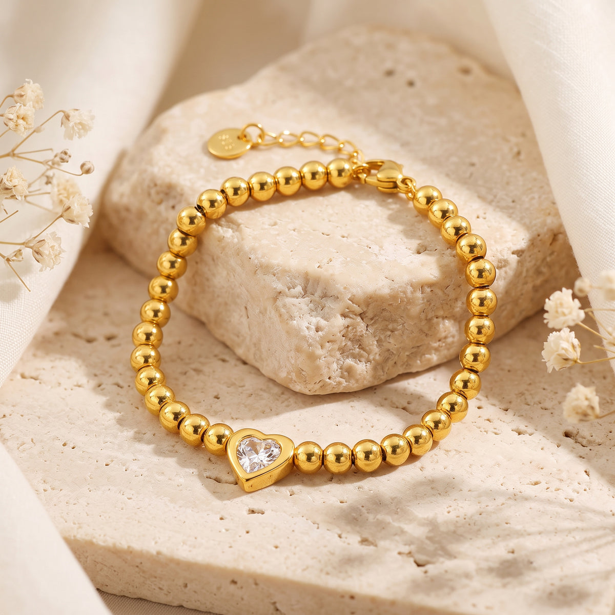 Das Perlenarmband mit Herz