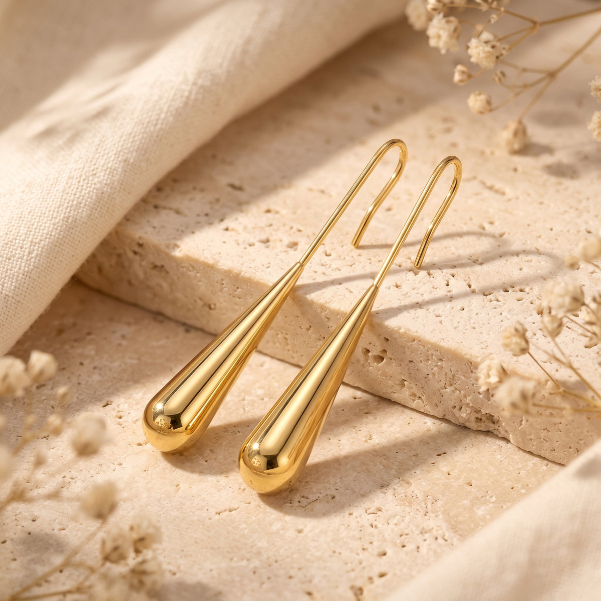 Les boucles d’oreilles goutte effilées