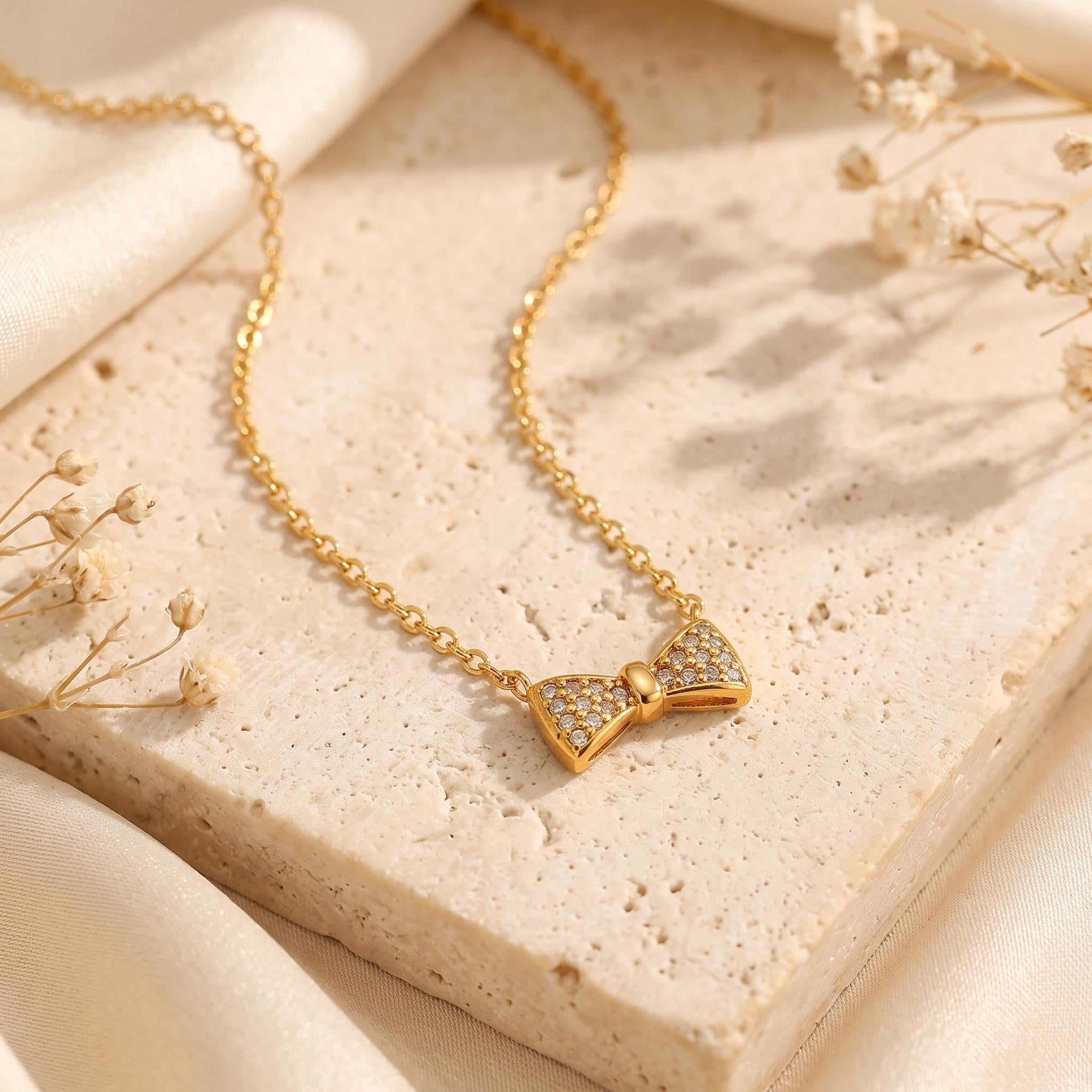 The Pave Bow Pendant Necklace