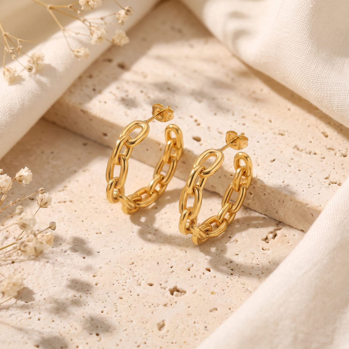 Les boucles d’oreilles créoles à maillons