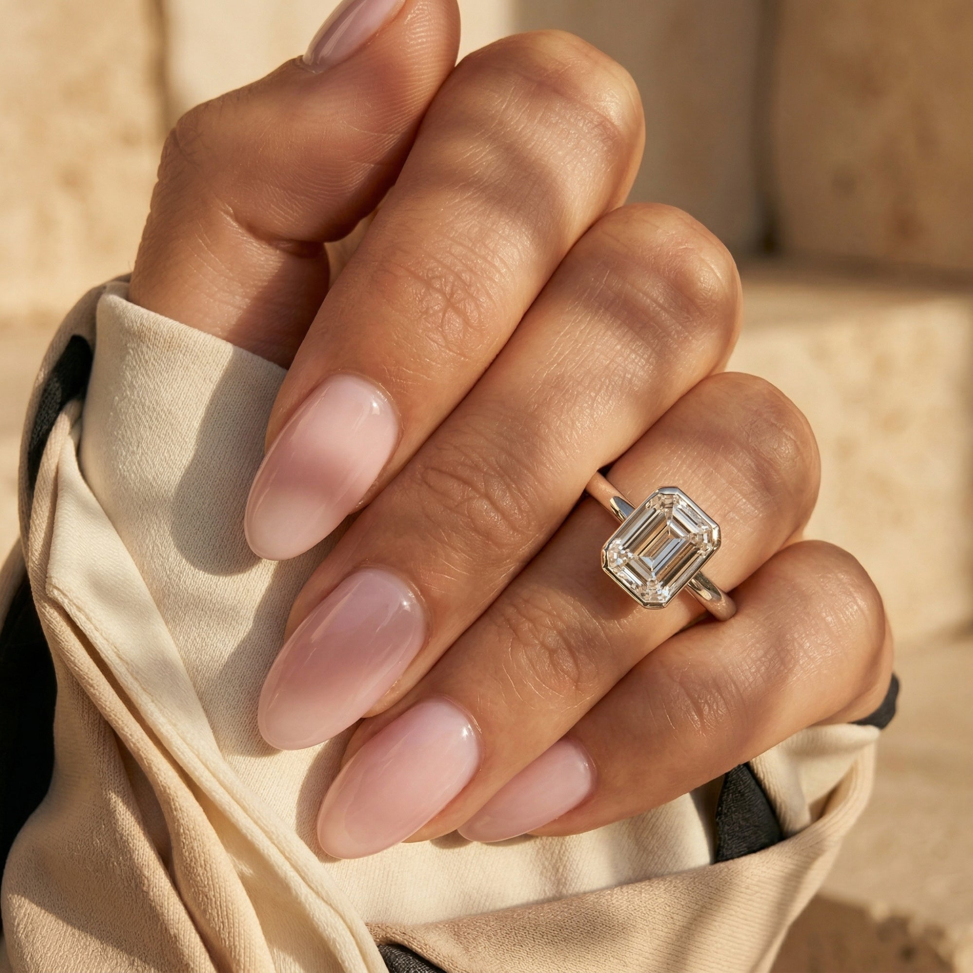 The Astrid Emerald Cut Bezel Ring