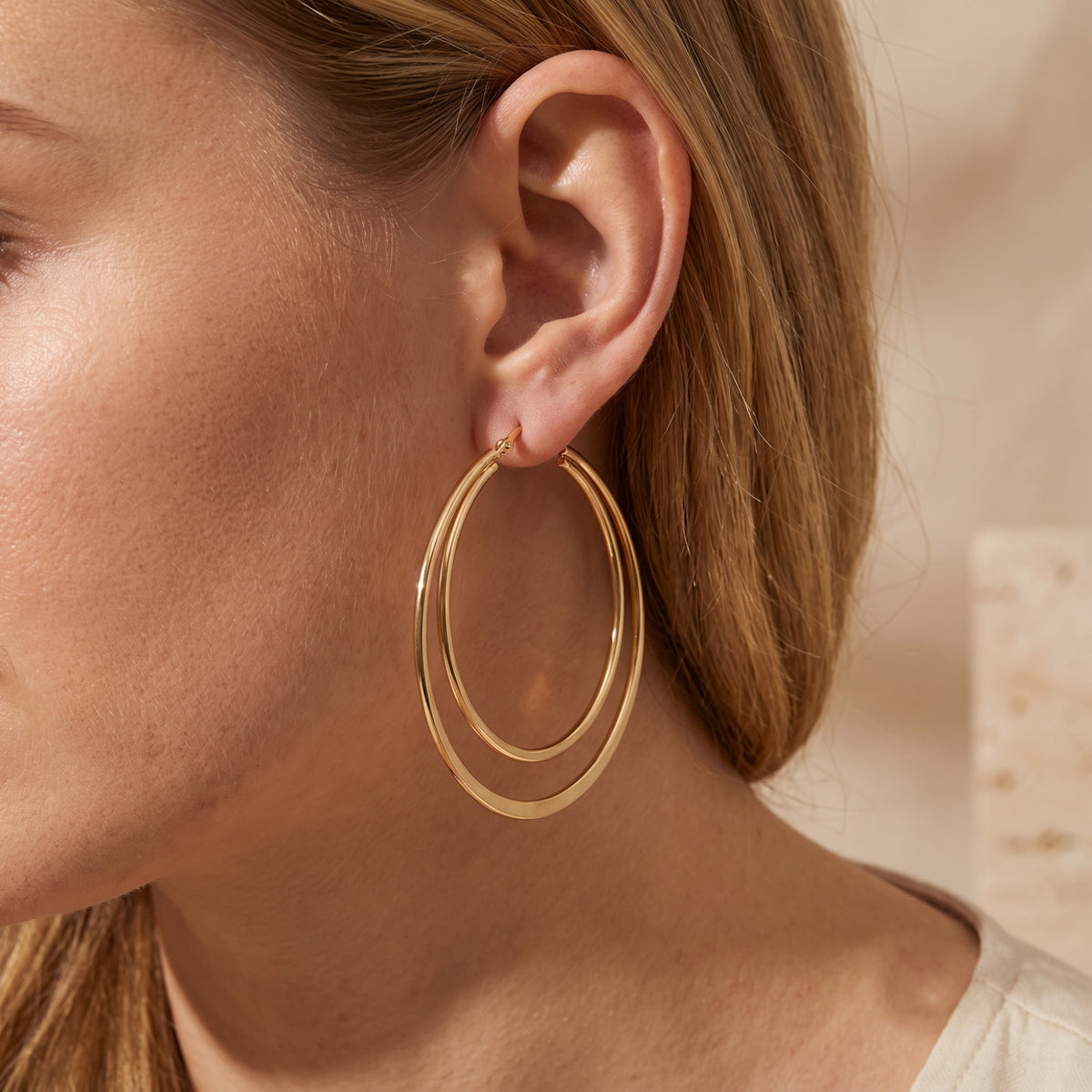 Les boucles d’oreilles créoles doubles Orbit
