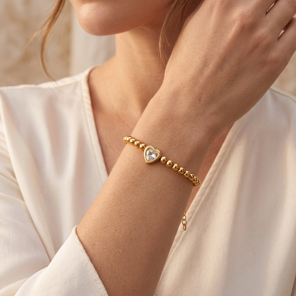Das Perlenarmband mit Herz