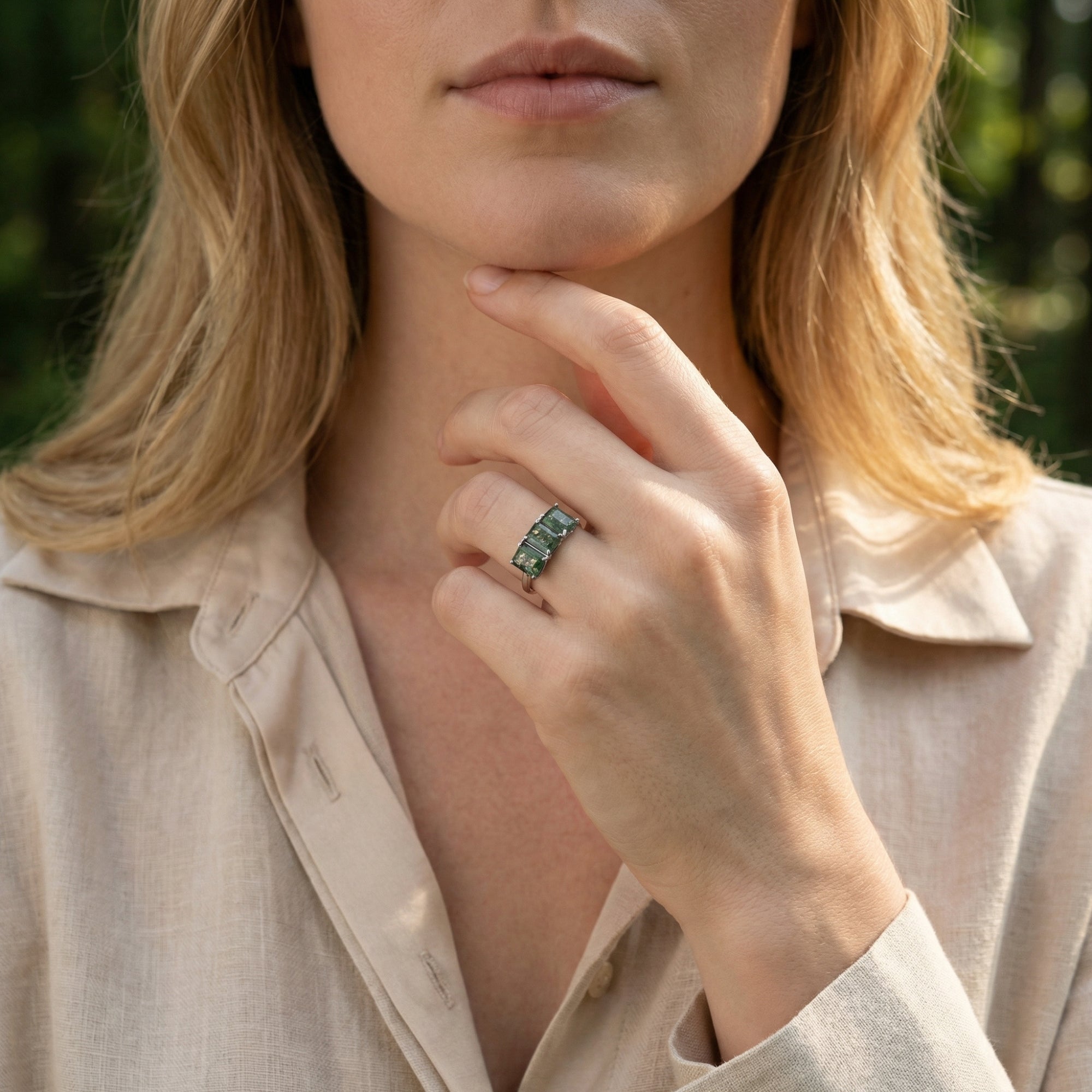 Model wearing the triple natural moss agate bar ring in S925 sterling silver on her ring finger.