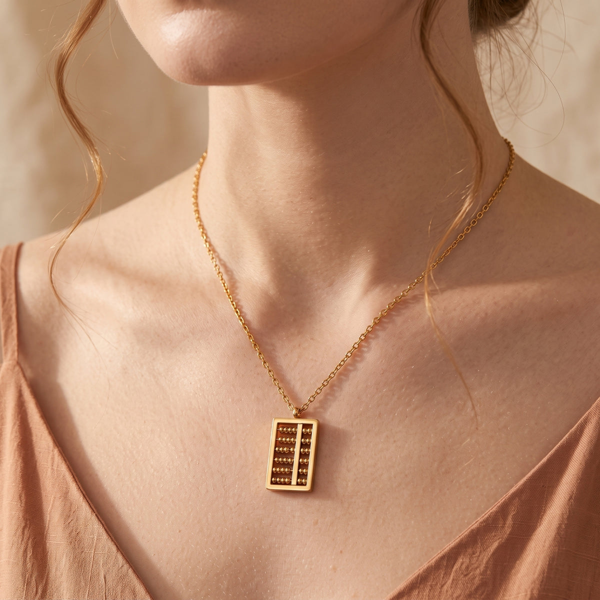 Le collier pendentif Abacus