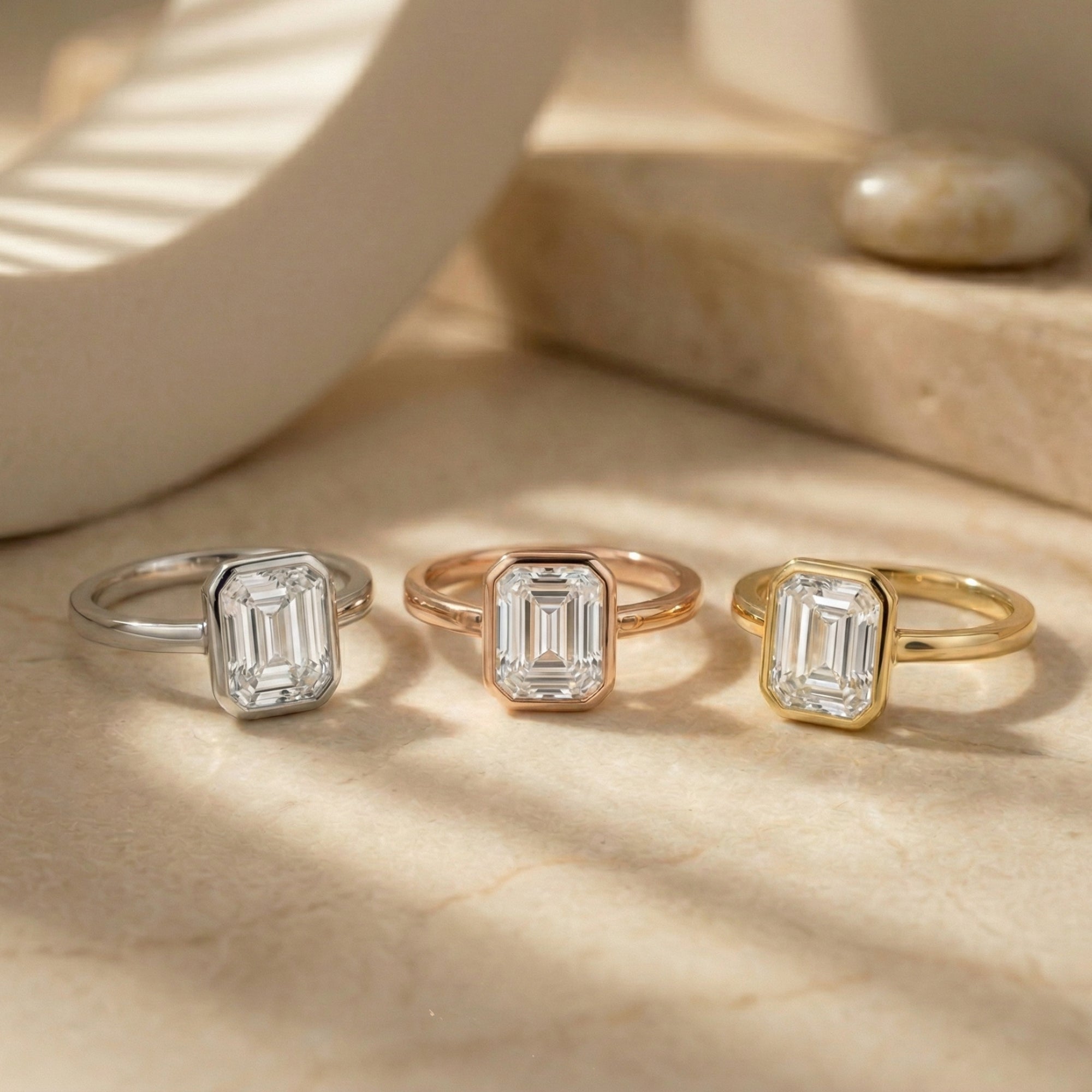 The Astrid Emerald Cut Bezel Ring