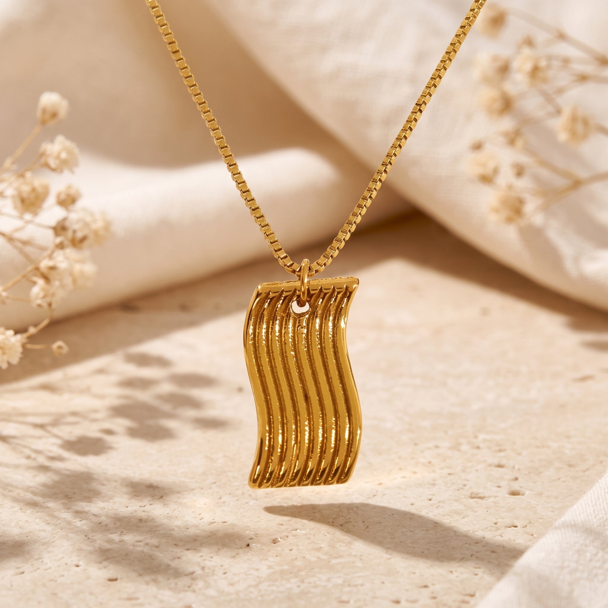 The Fluid Wave Pendant Necklace