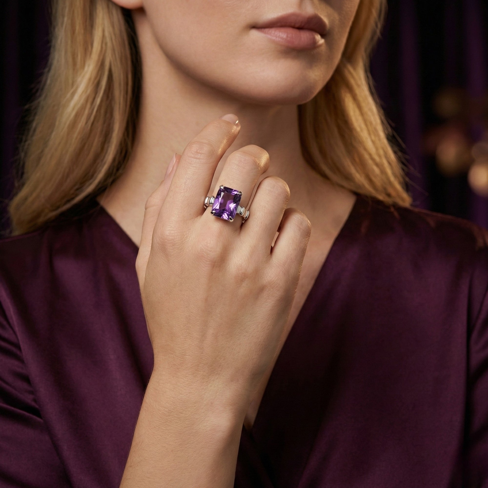 Large square cut amethyst sterling silver ring worn by a model to show scale and fit.
