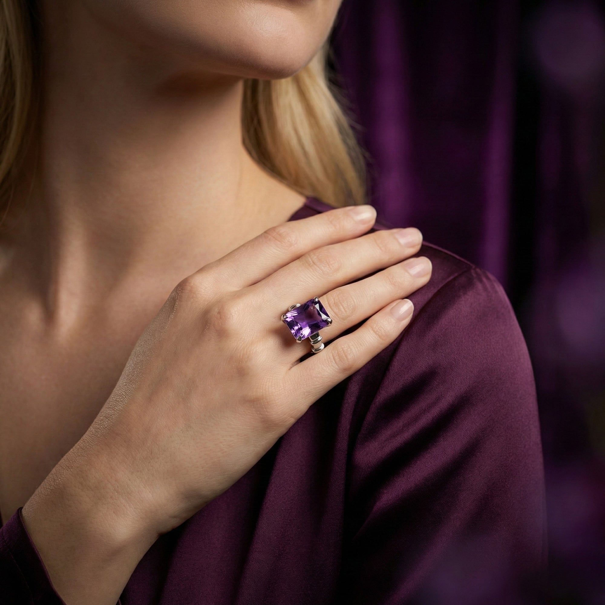 Model wearing the Soraya square cut amethyst ring in sterling silver on her hand.