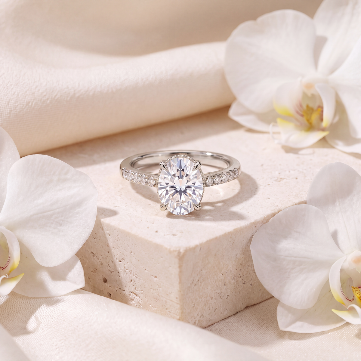 Front view of the oval moissanite engagement ring crafted in white gold with a pavé setting.