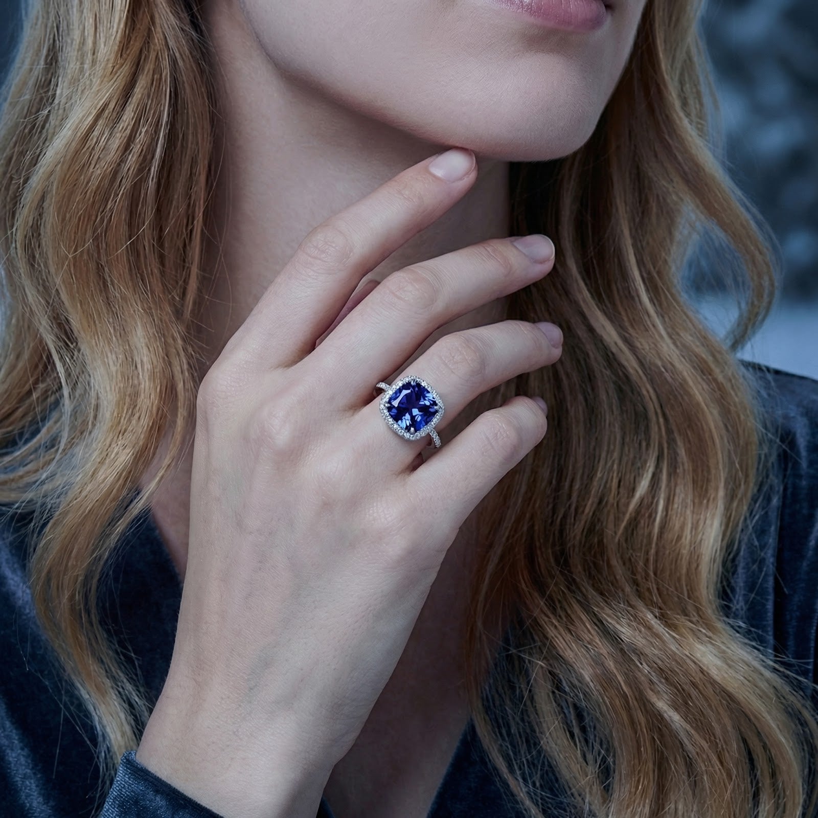 Model wearing the Mirelline cushion cut simulated tanzanite ring in S925 sterling silver.