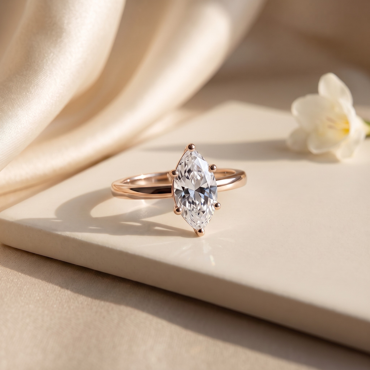 1CT marquise moissanite solitaire in rose gold, isolated product view