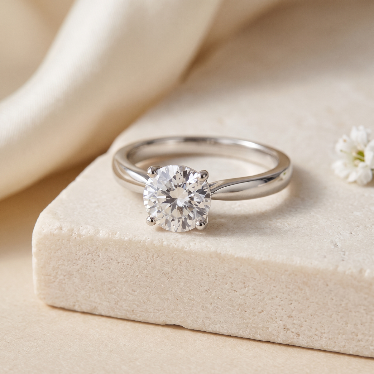 1CT brilliant round moissanite solitaire in silver, isolated product view