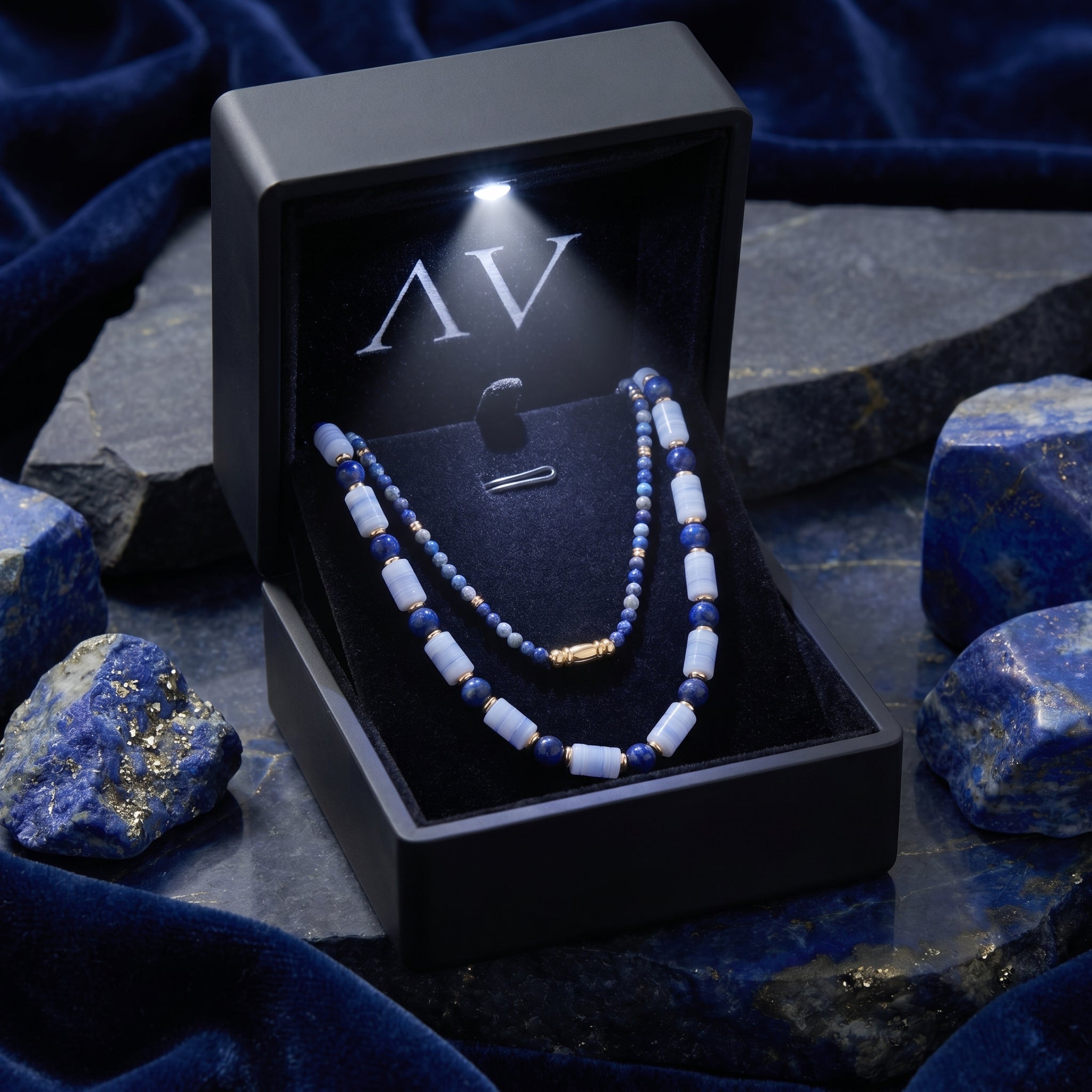 Lapis lazuli necklace set in a premium black LED-lighted gift box with raw lapis lazuli stone accents.