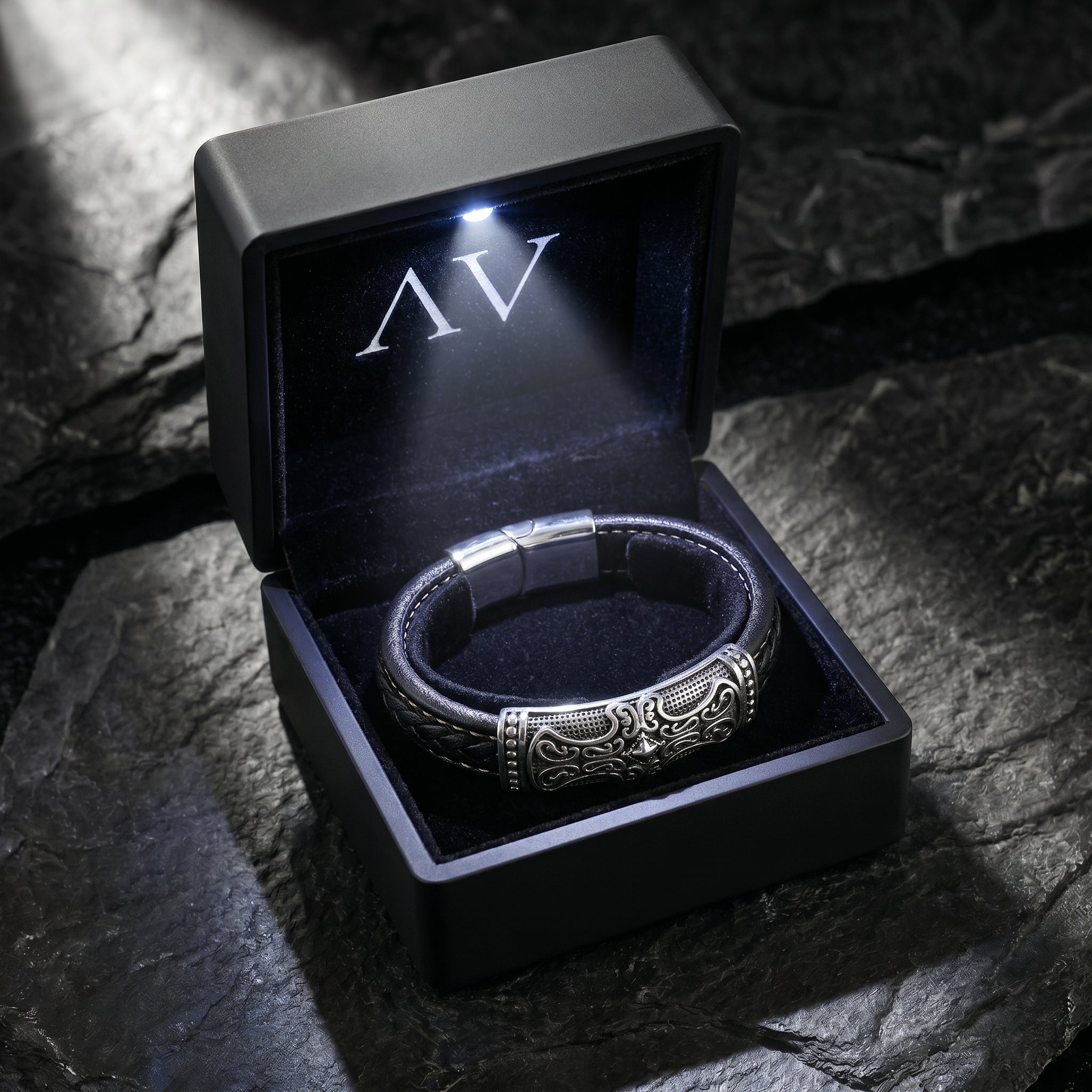 Runeforge braided leather bracelet inside a luxury black presentation box with a built-in LED light.