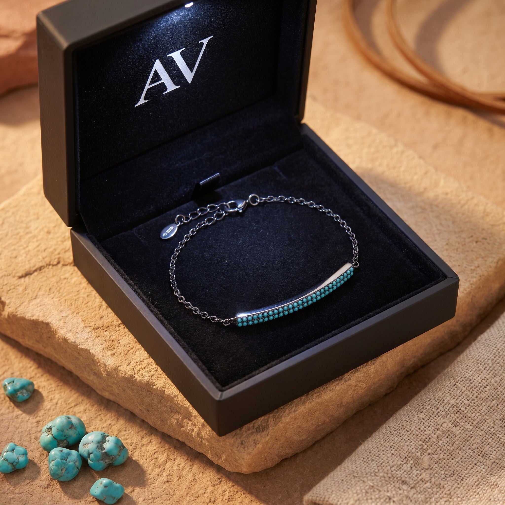 Escalante turquoise bar bracelet in sterling silver inside a premium black AV jewelry box with LED lighting.