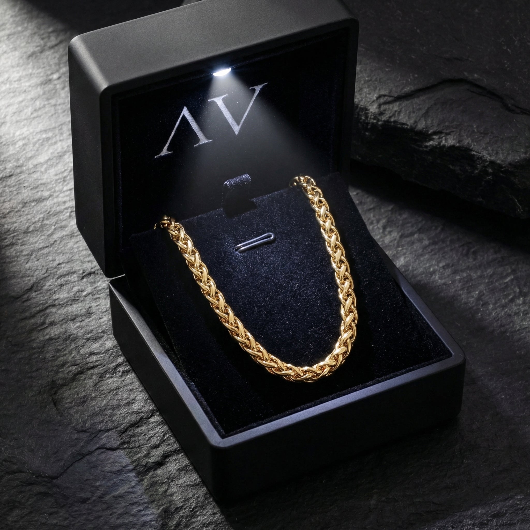 6mm gold stainless steel wheat chain inside a black LED-lit jewelry presentation box.