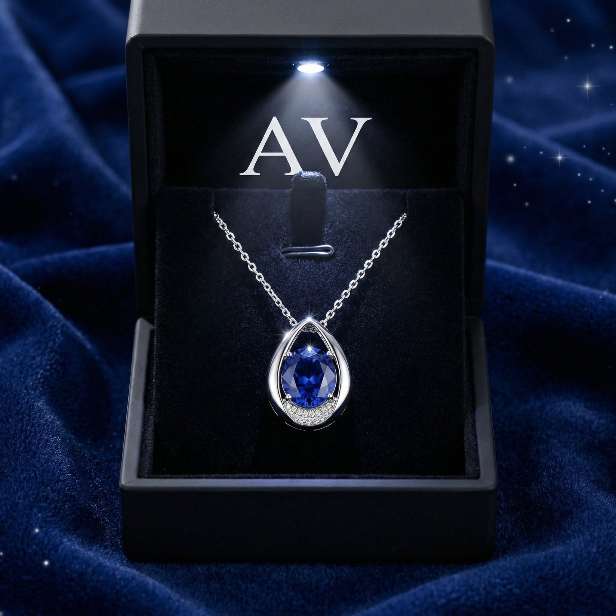 The Marisara teardrop necklace displayed inside a premium black LED-lighted jewelry gift box.