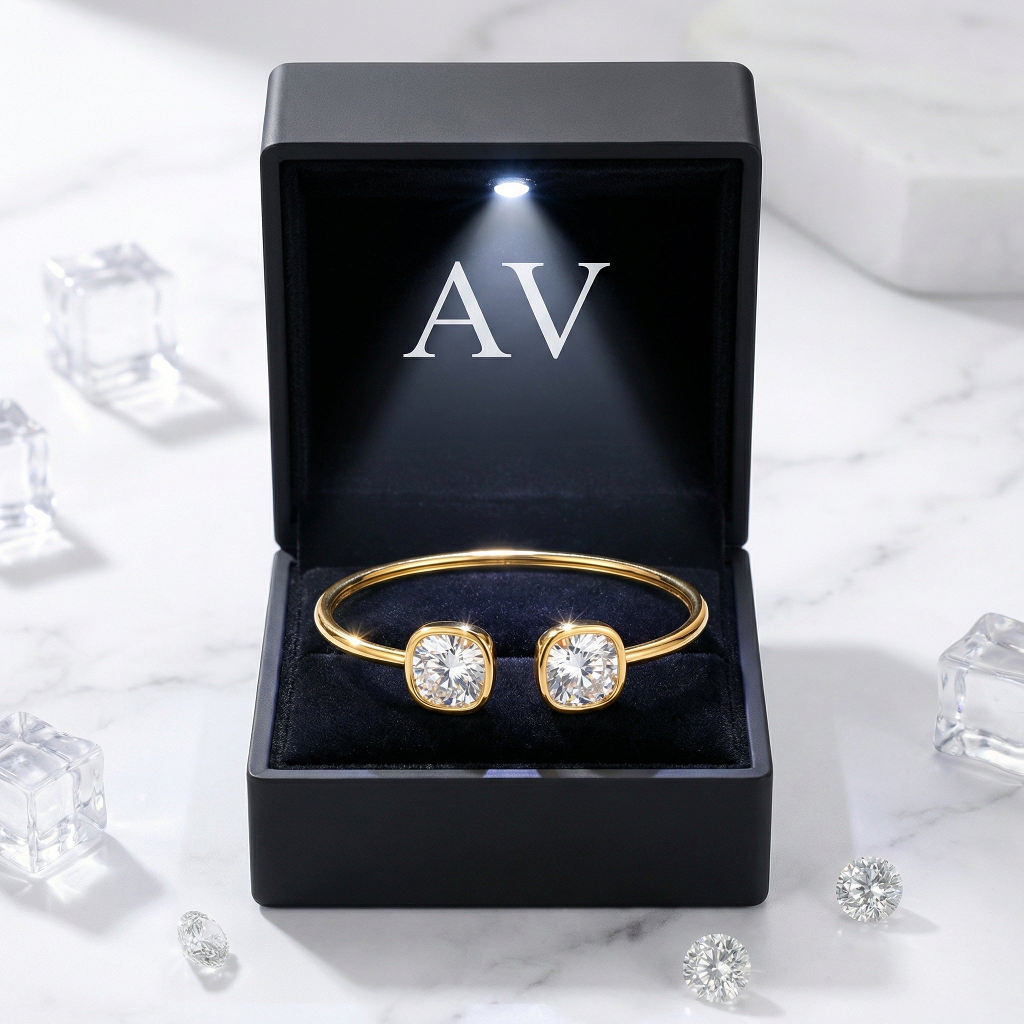 Gold-tone stainless steel moissanite cuff bracelet presented in a black LED-lit jewelry gift box.