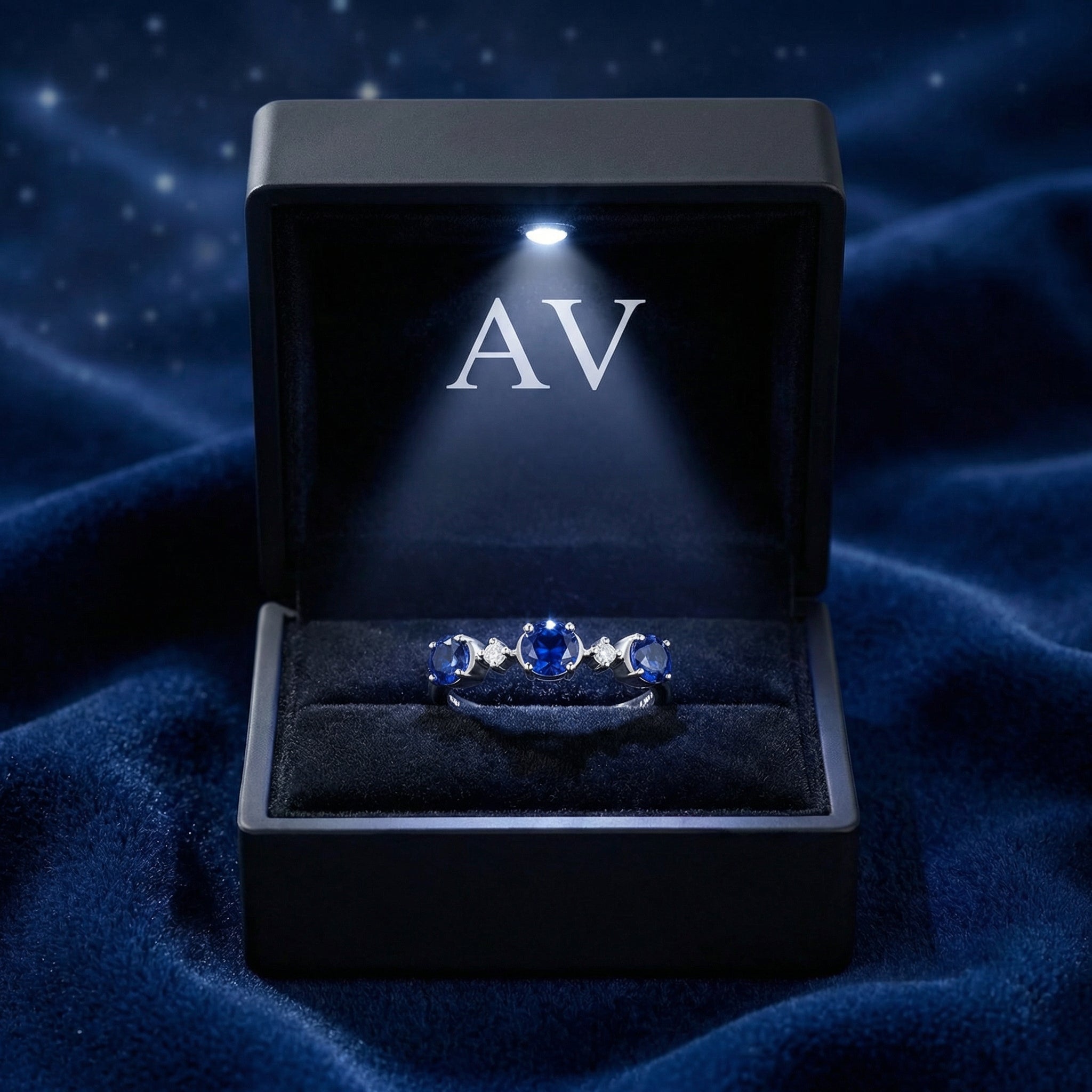 Nerisara S925 sterling silver sapphire ring presented in a black LED-lit jewelry gift box.