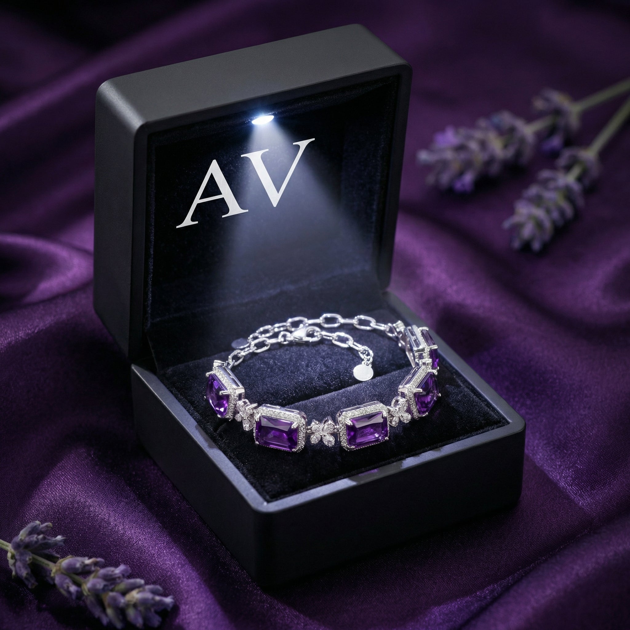 S925 sterling silver square cut amethyst bracelet inside a black lighted gift box with AV branding.