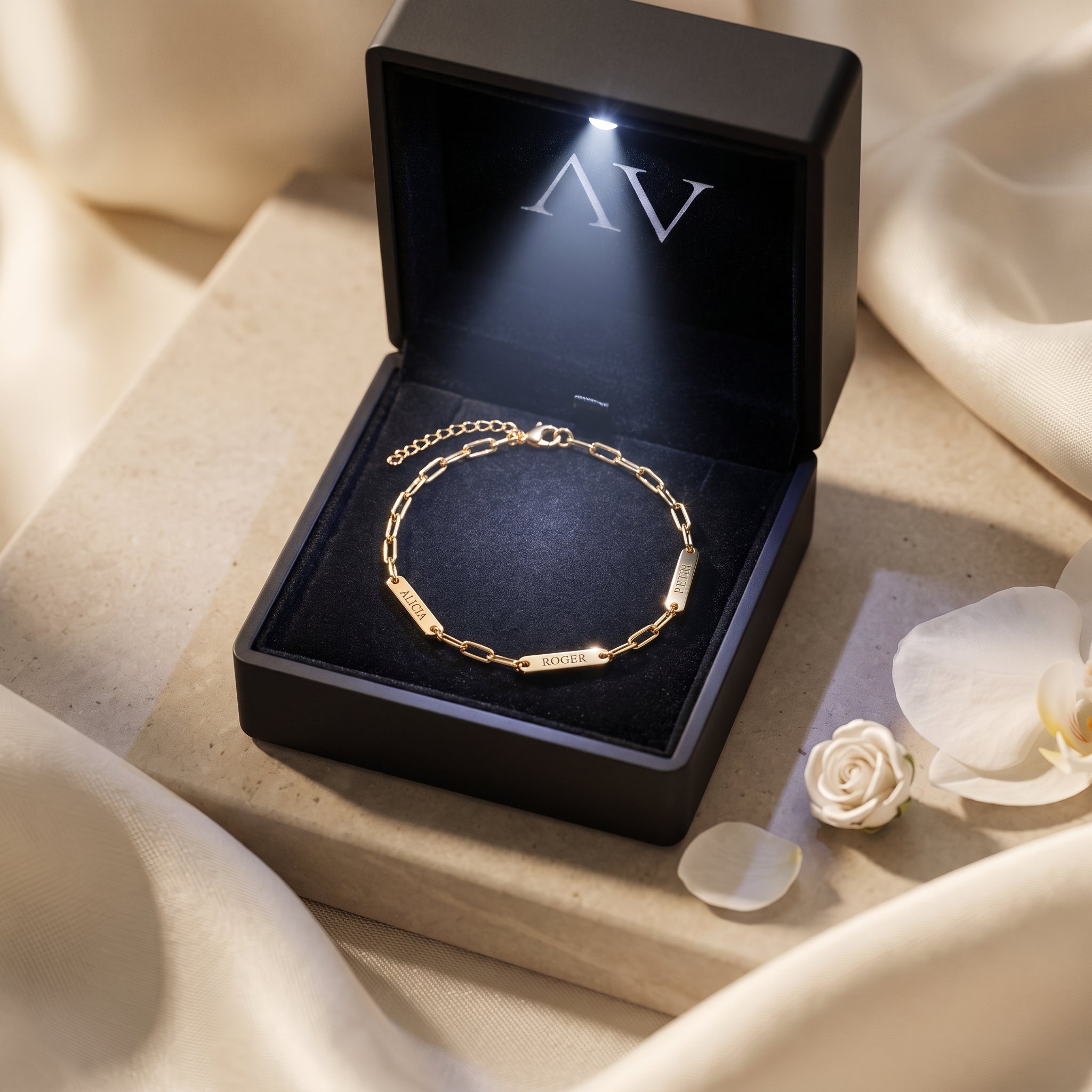 Gold Rosalba personalized bracelet in a black LED-lit jewelry gift box.