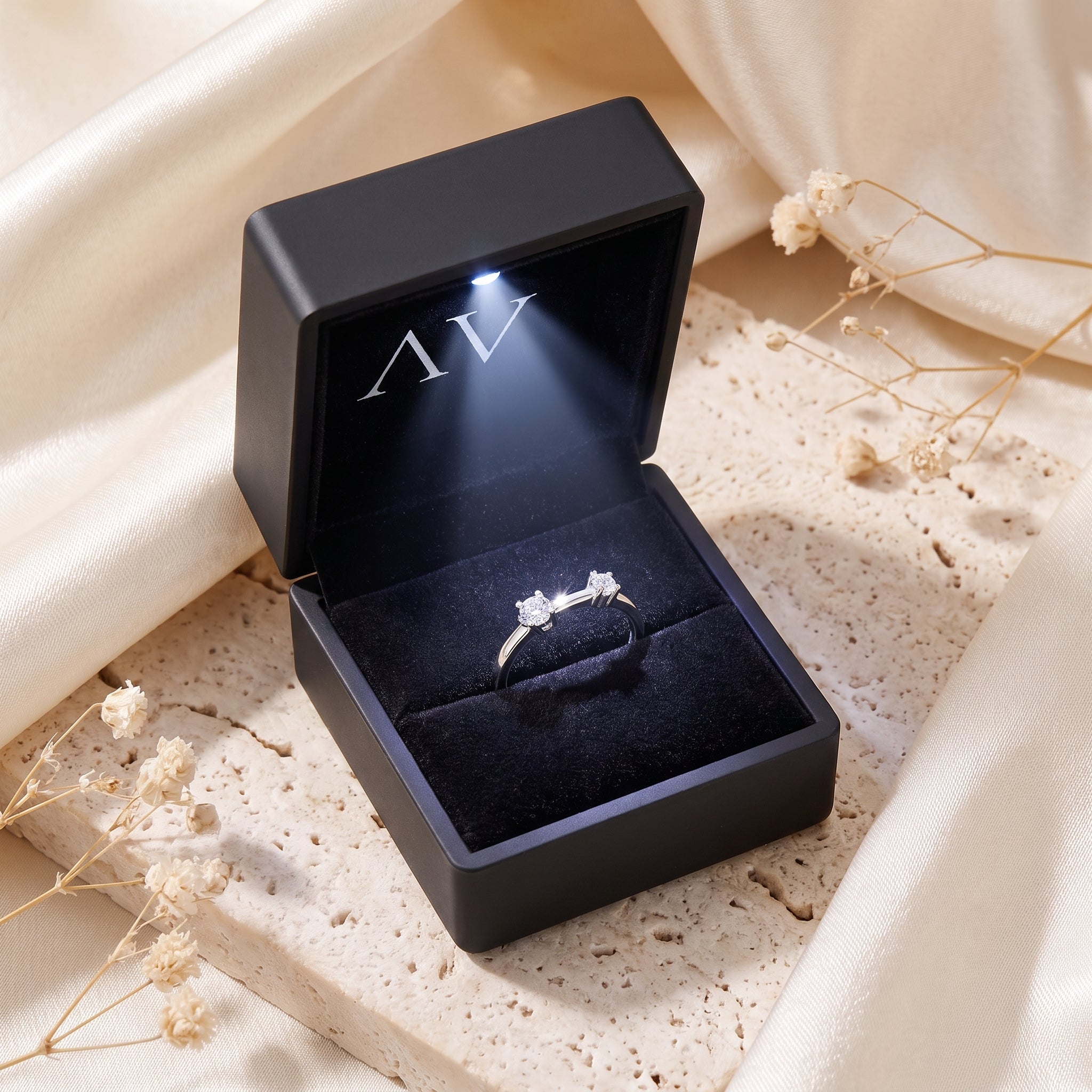 S925 sterling silver bypass ring presented in a black LED-lit jewelry gift box.