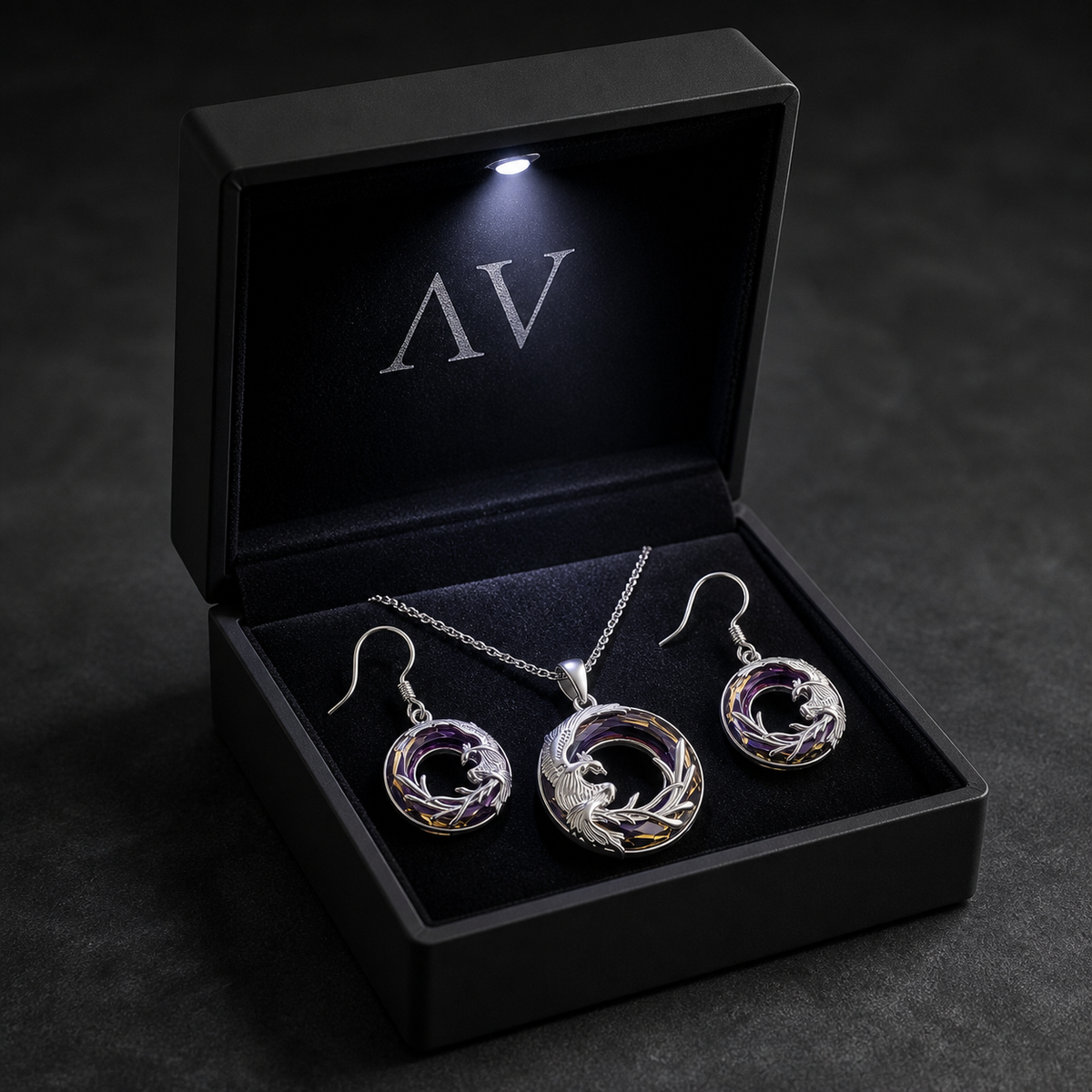 Sterling silver Phoenix crystal necklace and matching earrings in a black LED gift box