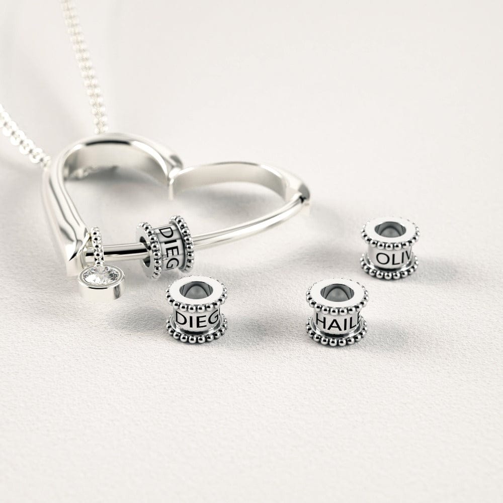 Heart Necklace with Engraved Beads & Diamond