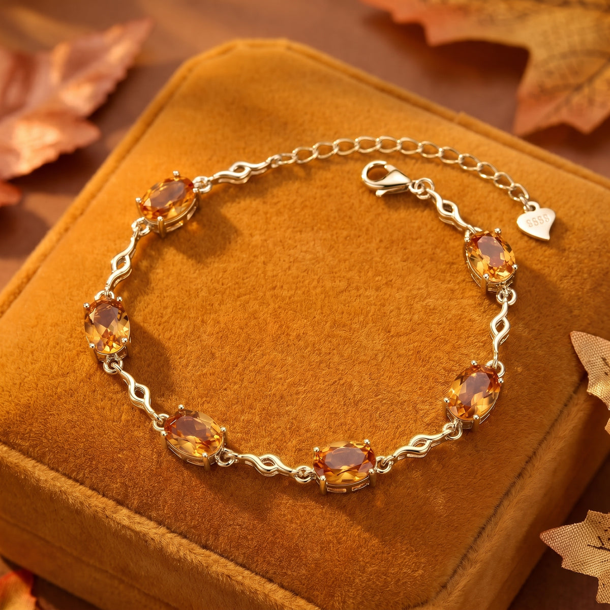 The Solstice Row bracelet with simulated topaz in yellow gold.
