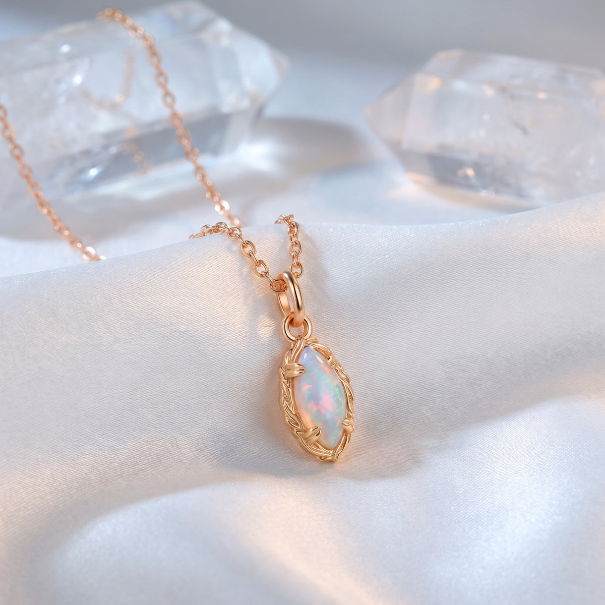 Marquise opal necklace in solid rose gold.