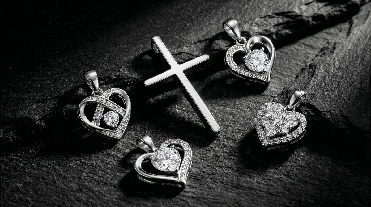Illustrative silver-tone cross and heart pendants without chains on dark wood; not verified depictions of listed products.