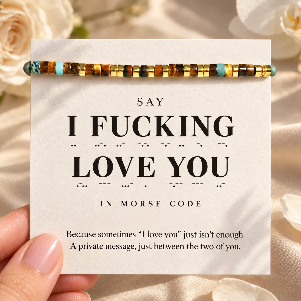 Morse-code bracelet with gold-tone PVD spacers, Tiger Eye and African Turquoise on its I Fucking Love You message card
