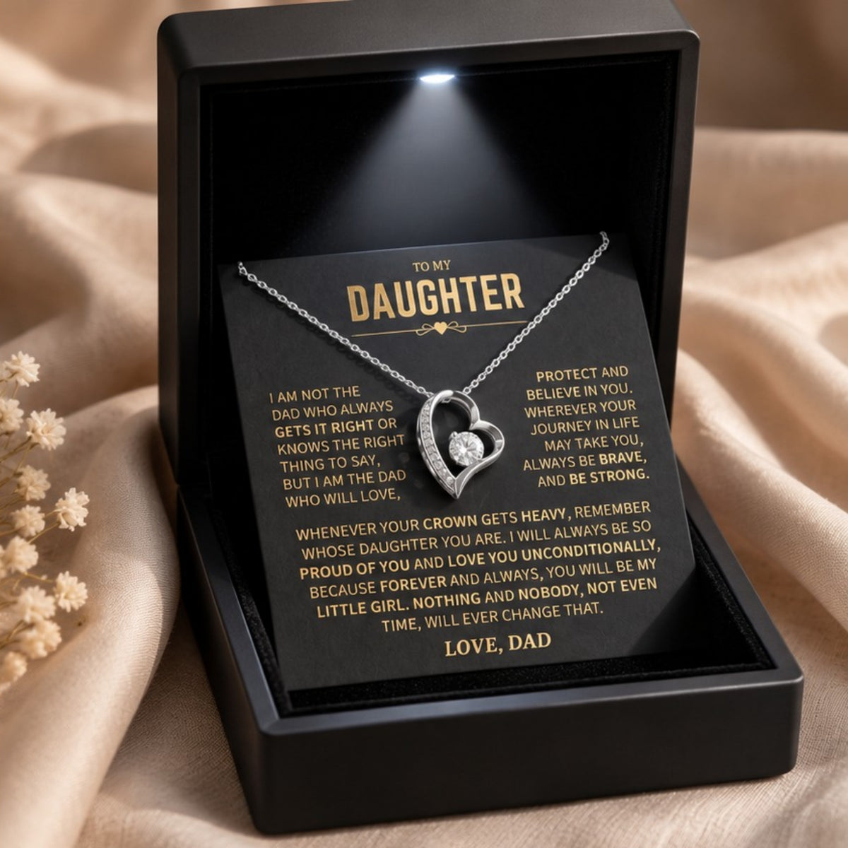 Silver-finish asymmetric heart necklace in a black LED gift box with the To My Daughter message card from Dad.