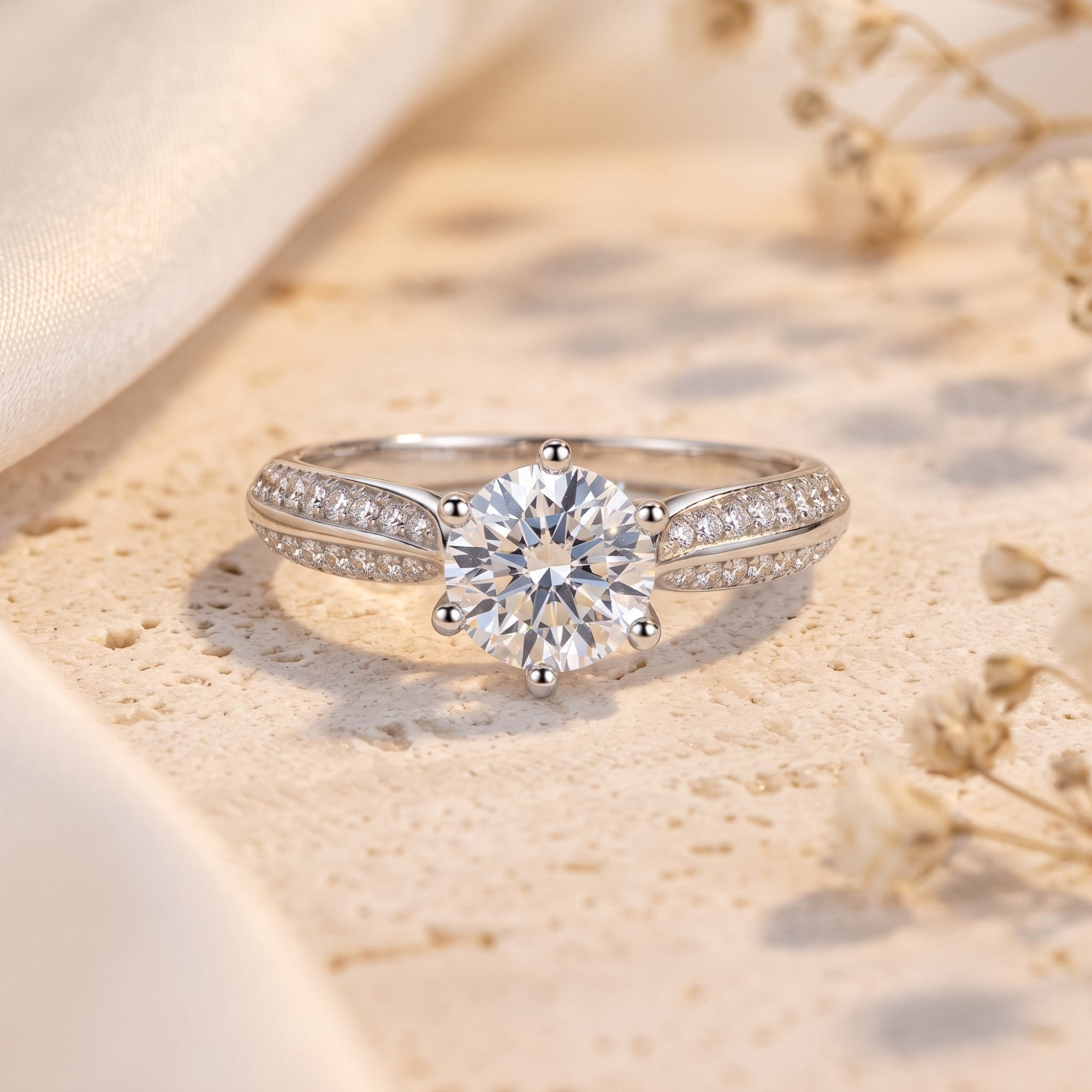 Round-cut simulated diamond ring in S925 sterling silver with pave split-shank on stone.