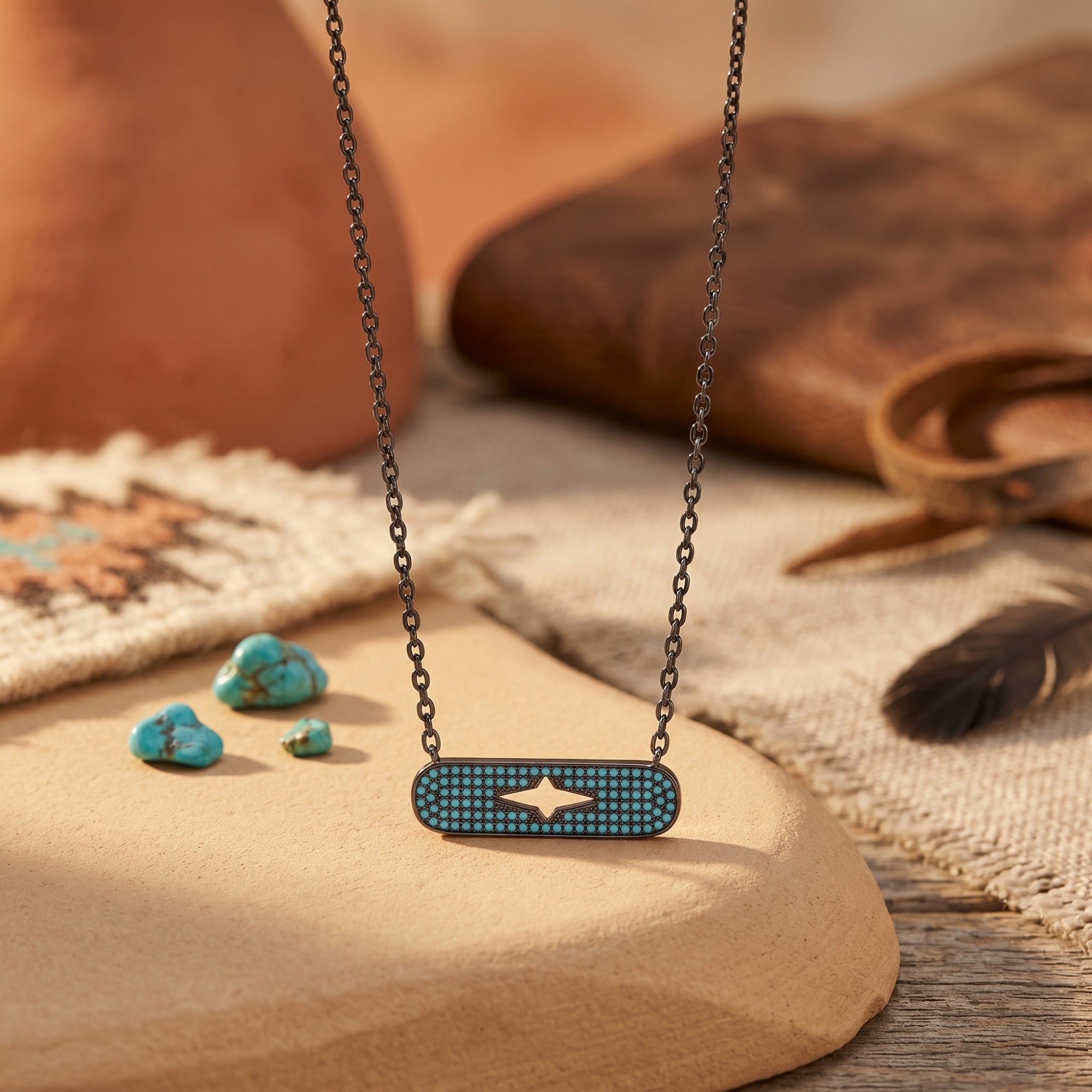 Chaco turquoise bar necklace in sterling silver displayed on a stone with Southwest-inspired decor.
