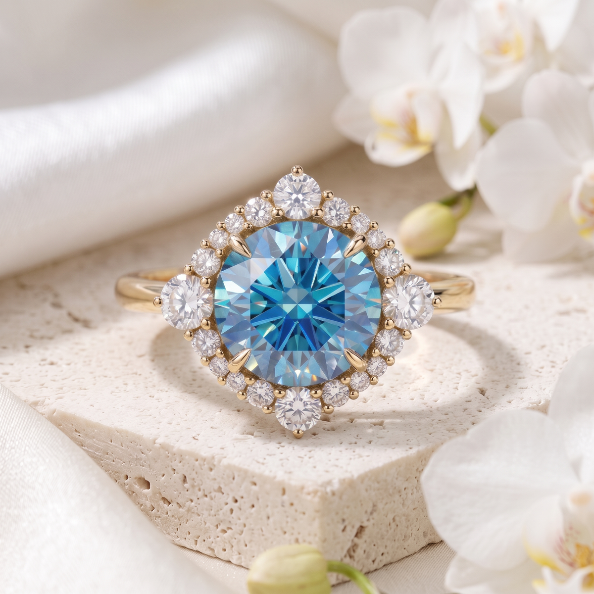 Yellow gold halo moissanite ring featuring a brilliant round blue center stone and diamond halo on stone display.