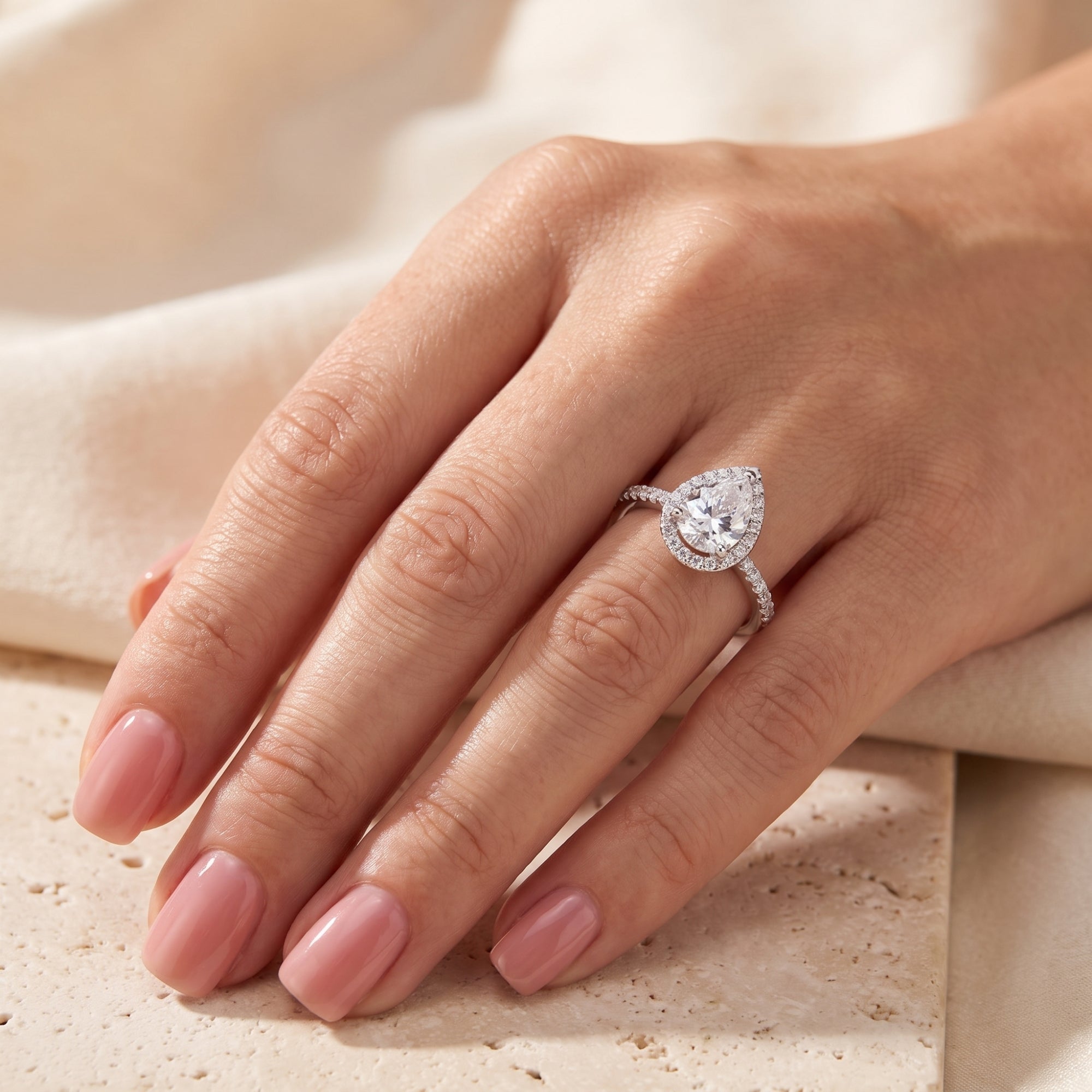The Aurelia Pear Halo Ring