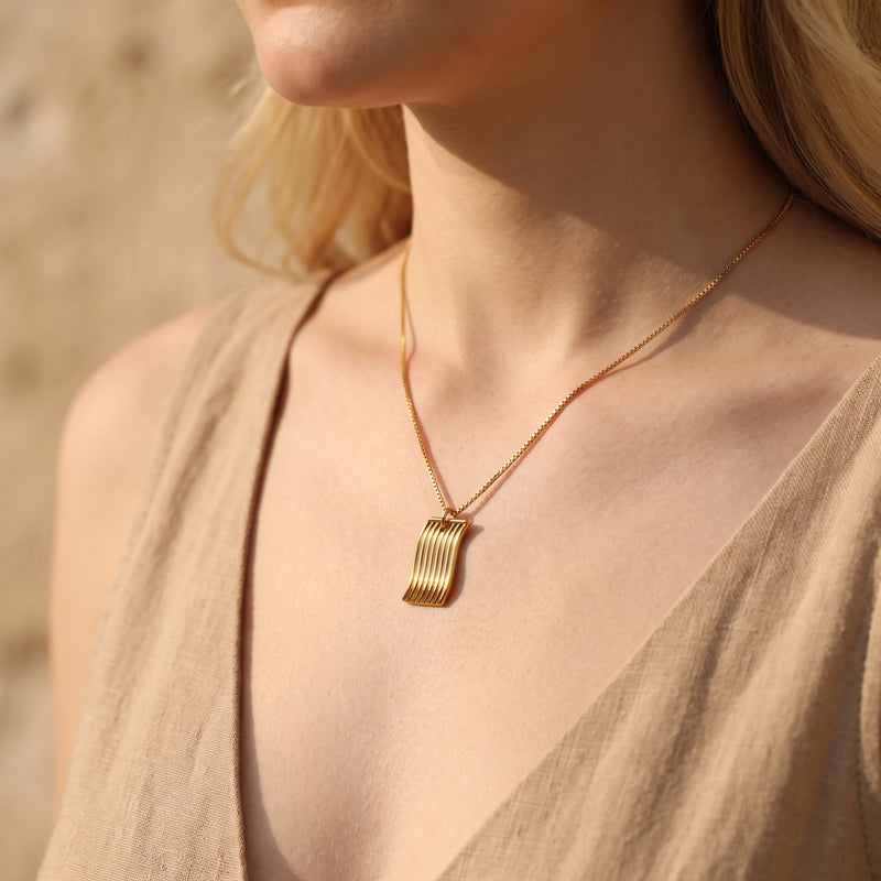 The Fluid Wave Pendant Necklace
