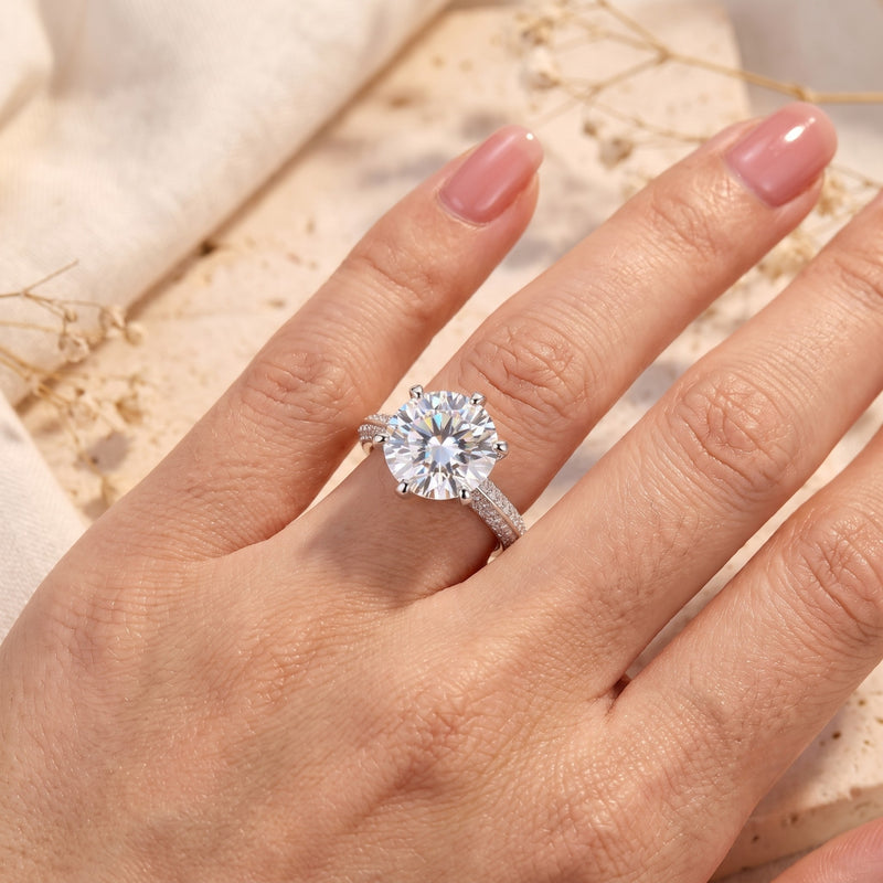 S925 sterling silver 11mm round solitaire ring worn on a hand, showing scale and sparkle.