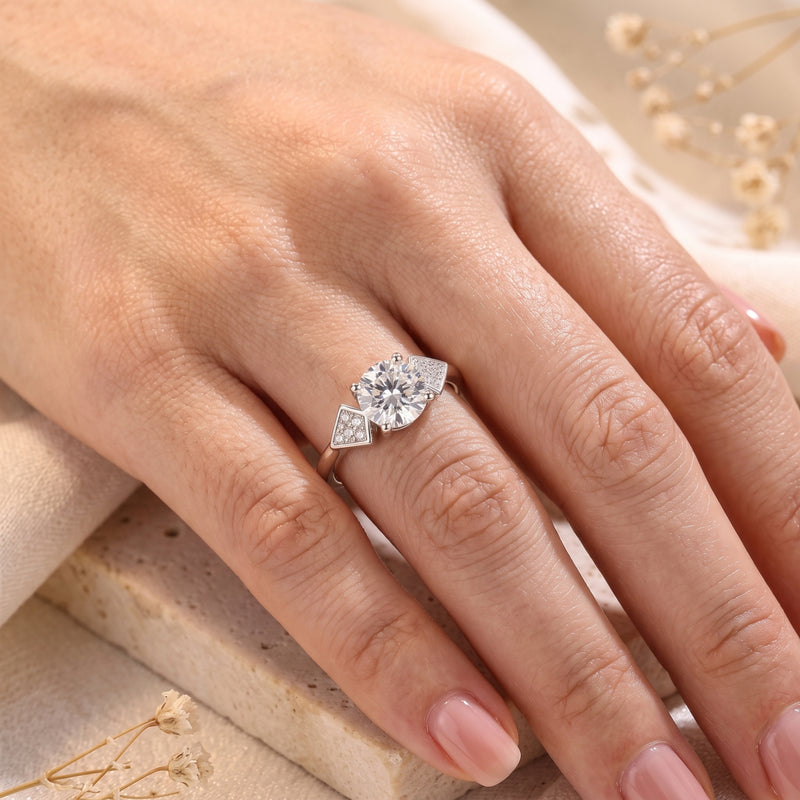 S925 sterling silver geometric ring with round brilliant stone worn on hand.