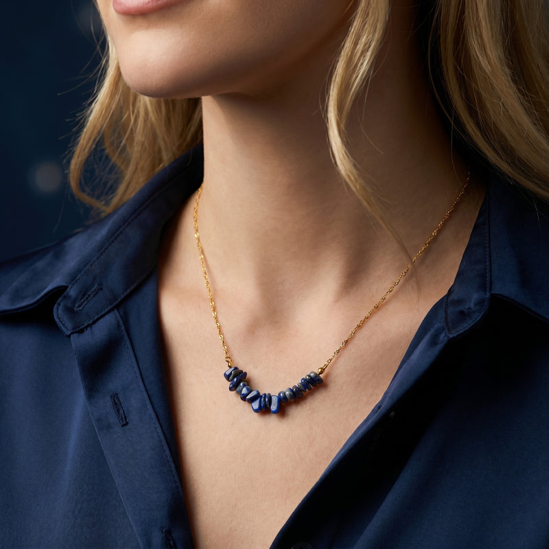 Model wearing the natural lapis lazuli chip bar necklace on an 18K gold plated chain.