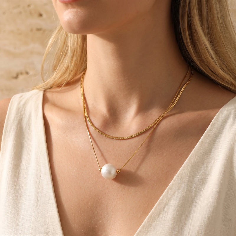 El collar de perlas en capas
