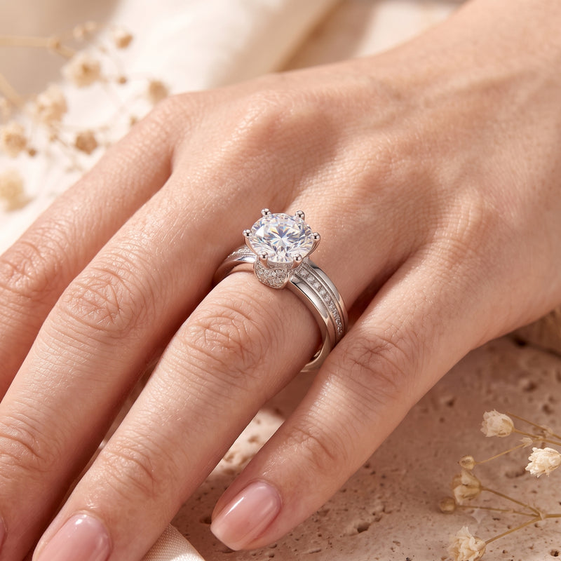 S925 sterling silver round brilliant solitaire ring on a model's hand.